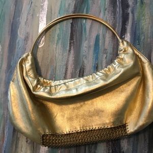 Karine Arabian gold clutch